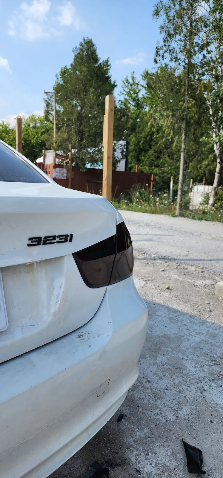 BMW — Smoked Taillight Tint, rear three-quarter view