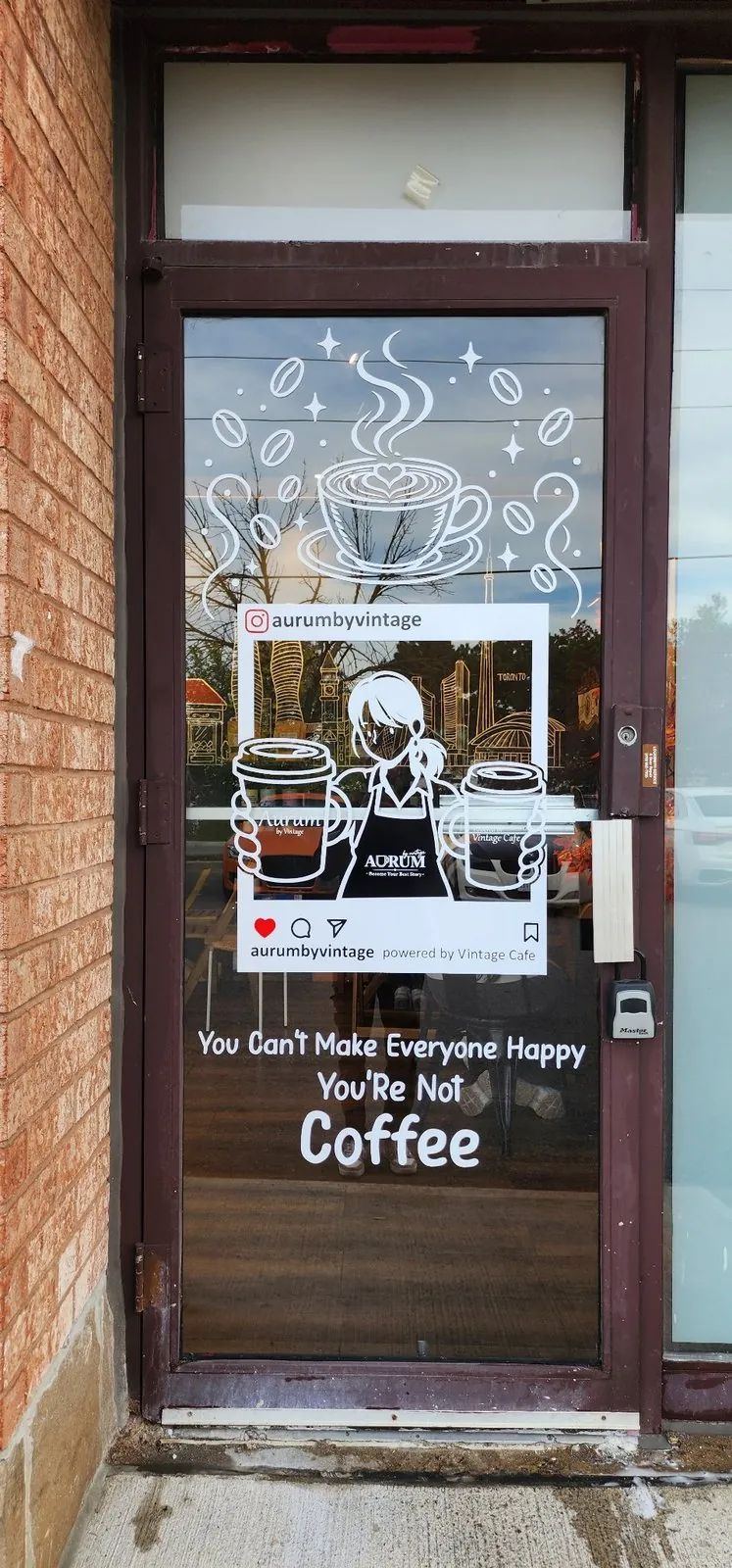 Coffee shop entry door with custom vinyl artwork