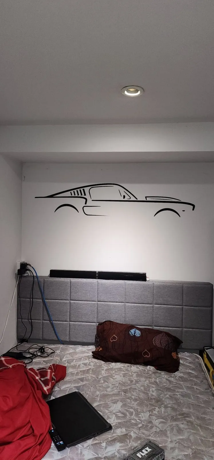 Car silhouette wall decal installed in a living space
