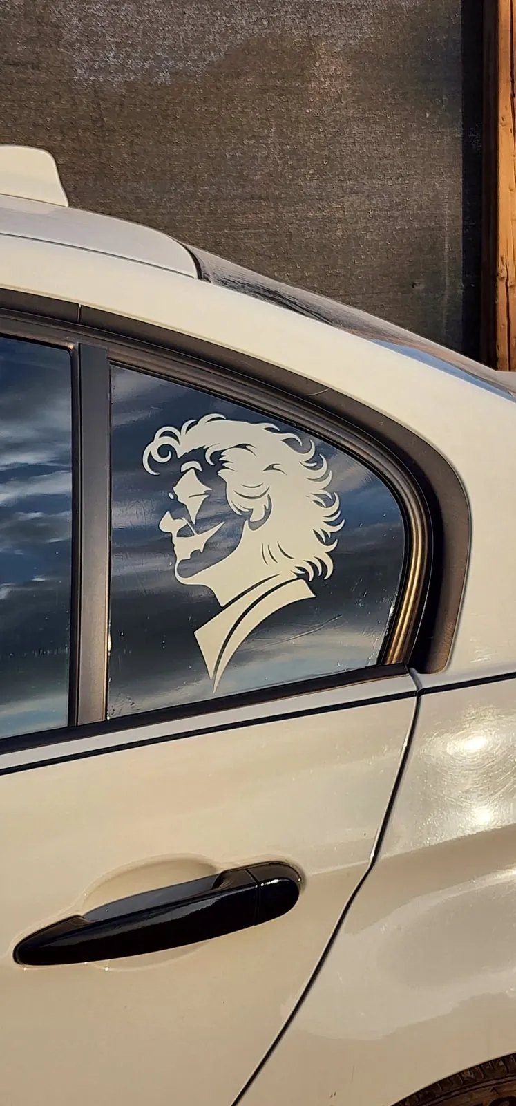 Custom portrait window decal fitted on a car window